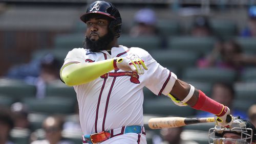 Atlanta Braves designated hitter Marcell Ozuna (20) hits a double in the eighth inning of a baseball game against the Oakland Athletics Sunday, June 2, 2024, in Atlanta. (AP Photo/John Bazemore)