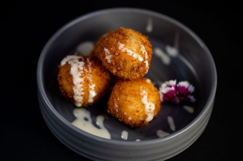 Croquetas at Casa Robles burst with the flavors of Serrano ham and Manchego cheese. Photo by Randi Curling