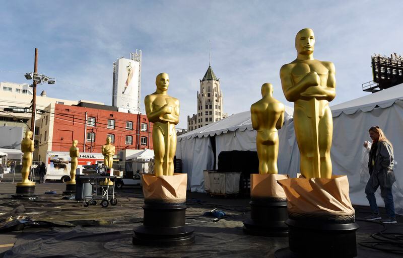 Oscar statues stand outside Hollywood Boulevard. The Academy Awards show drew its lowest rating Sunday night.