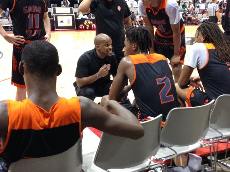 Game Elite coach Chris Williams talks to his team during a timeout during the Adidas Summer Championships in Las Vegas July 28, 2017.