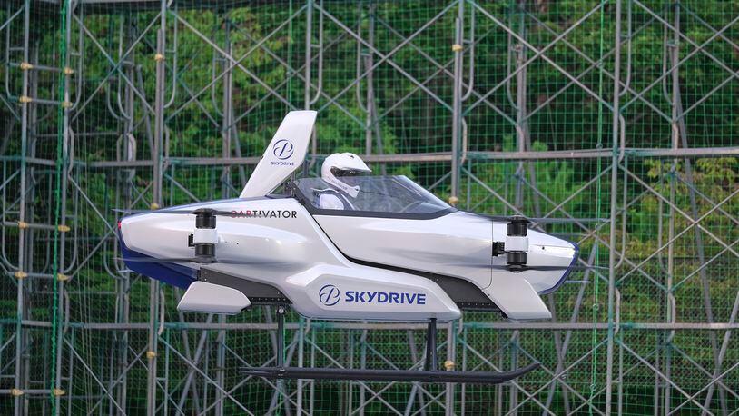 This photo taken at the beginning of August and released by ©SkyDrive/CARTIVATOR 2020 shows a test flight of a manned "flying car" at Toyota Test Field in Toyota, central Japan. Japan’s SkyDrive Inc., among myriads of “flying car” projects around the world, has carried out a successful-though-modest test flight with one person aboard.