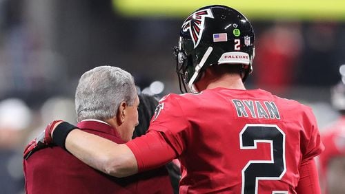 Falcons quarterback Matt Ryan gives owner Arthur Blank a hug before playing the Saints in a NFL football game on Thursday, December 7, 2017, in Atlanta.  Curtis Compton/ccompton@ajc.com
