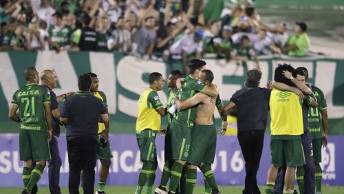 In this Wednesday, Nov. 23, 2016, file photo, players of Brazil's Chapecoense celebrate at the end of a Copa Sudamericana semifinal soccer match against Argentina's San Lorenzo in Chapeco, Brazil. (AP Photo/Andre Penner, File)