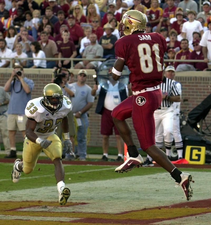 P.K. Sam played for Florida State against Georgia Tech in 2001. Sam is back at FSU finishing his degree. “I do wish they kept better track (of concussions), so at least you were informed,” he says. CURTIS COMPTON / AJC