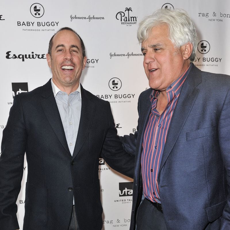 Jerry Seinfeld, left, and Jay Leno attend the Inaugural Los Angeles Baby Buggy Fatherhood Lunch at Palm Restaurant on Wednesday, March 4, 2015, in Beverly Hills, Calif. (Photo by Richard Shotwell/Invision/AP)