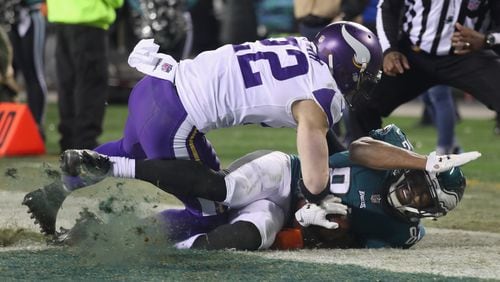 PHILADELPHIA, PA - JANUARY 21:  Torrey Smith #82 of the Philadelphia Eagles scores a third quarter touchdown past Harrison Smith #22 of the Minnesota Vikings in the NFC Championship game at Lincoln Financial Field on January 21, 2018 in Philadelphia, Pennsylvania.  (Photo by Rob Carr/Getty Images)