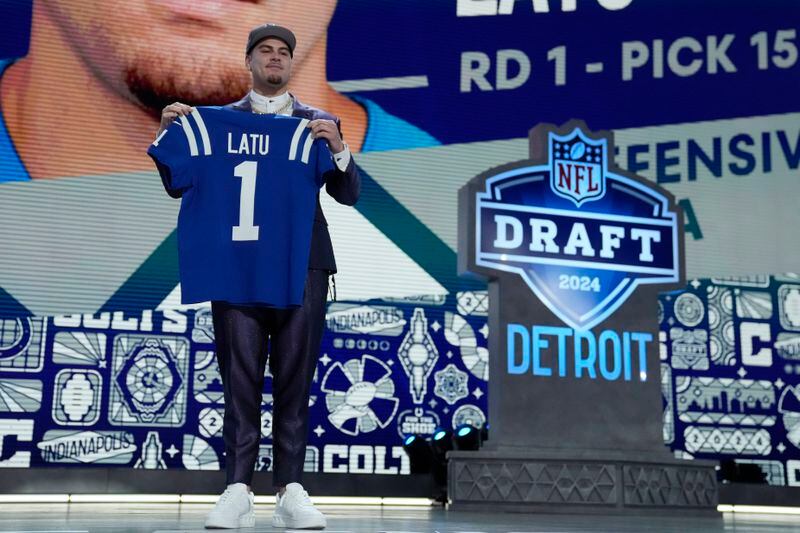 UCLA defensive lineman Laiatu Latu poses after being chosen by the Indianapolis Colts with the 15th overall pick during the first round of the NFL football draft, Thursday, April 25, 2024, in Detroit. (AP Photo/Jeff Roberson)