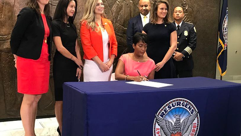 Mayor Keisha Lance Bottoms on Thursday signed an executive order directing that all remaining U.S. Immigration and Customs Enforcement detainees be transferred out of the city’s jail and declaring the jail will no longer hold people for the federal agency. JEREMY REDMON/jredmon@ajc.com