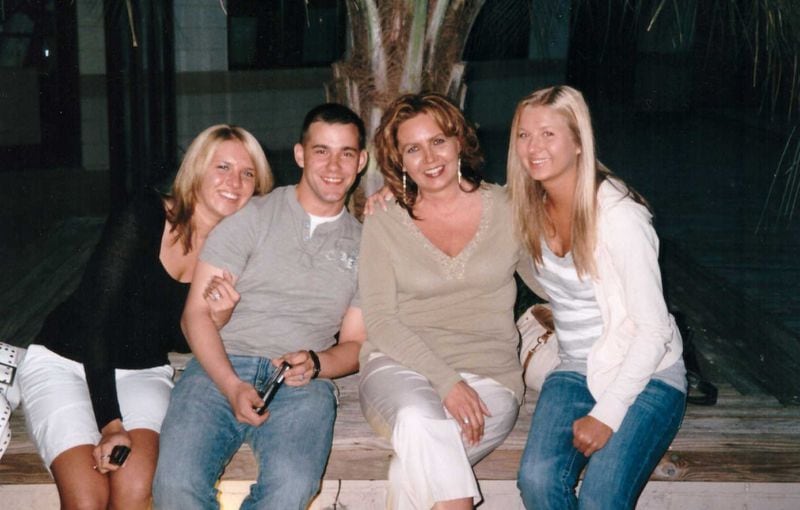 Natalie Eppler (far left) pictured in 2006 with her husband James Eppler, who would later be arrested on murder charges, mother Rebecca Holland and sister Alexandra Wlaszyn-Keesee. (photo courtesy of Rebecca Holland)