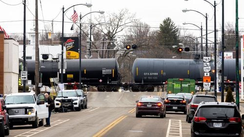 A train passes through East Palestine, Ohio, on Feb. 17, 2023. (Arvin Temkar/Atlanta Journal-Constitution/TNS)