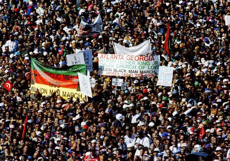 A portion of the crowd of people attending the Million Man March in 1995 wave banners on the Capitol grounds. The National Park Service estimated the crowd at 400,000. FILE PHOTO