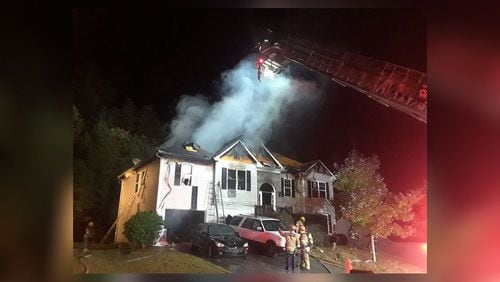 Eight family members escaped a Gwinnett County house fire Friday evening before their home was destroyed.