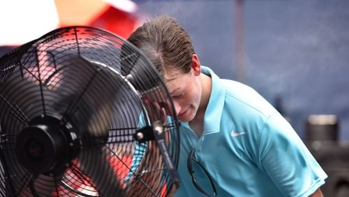 Harry Immel cools off during the BB&T Atlanta Open at Atlantic Station on Wednesday, July 29, 2015.