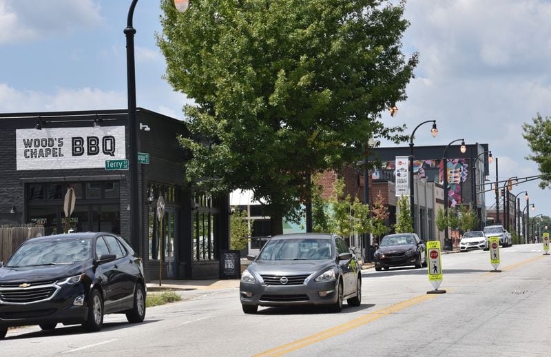 Recently opened shops as a part of a mixed-use project along Georgia Avenue, a couple of blocks east of Georgia State Stadium in Atlanta on Wednesday, August 14, 2019. 