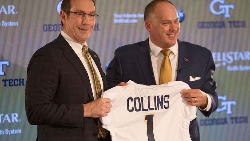 Athletic Director Todd Stansbury (left) poses with Geoff Collins who was named Georgia Tech football coach at a news conference in Atlanta on December 7, 2018. (Photo by Phil Skinner)