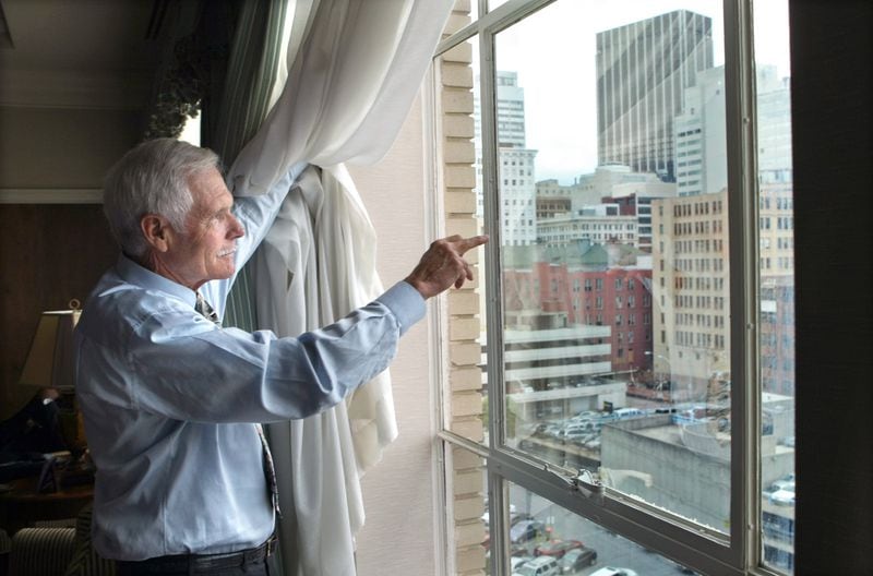 From his 8th-story office above Ted’s Montana Grill in downtown Atlanta, Ted Turner can look down on the stretch of parking lots along the stretch of Spring Street that will be renamed Ted Turner Drive. AJC FILE PHOTO