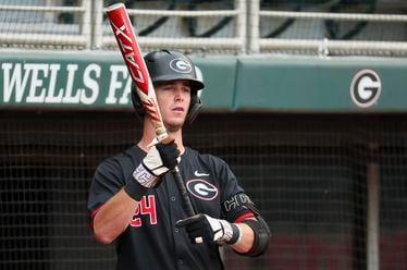Georgia third baseman Charlie Condon (24) prepares for his first at bat during the first inning of their game against Vanderbilt at Foley Field, Friday, May 3, 2024, in Athens, Ga. Condon hit his 31st and NCAA leading home run Friday night. No. 19-ranked Georgia defeated No. 13 Vanderbilt 10-0. (Jason Getz / AJC)
