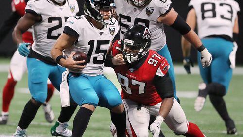 Falcons defensive tackle Grady Jarrett sacks Jacksonville Jaguars quarterback Gardner Minshew.  Curtis Compton/ccompton@ajc.com