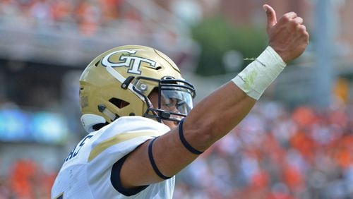 Georgia Tech Yellow Jackets quarterback Justin Thomas (5) celebrates after he scored a touchdown against the Mercer Bears in the first half at Bobby Dodd Stadium on Saturday, September 10, 2016. HYOSUB SHIN / HSHIN@AJC.COM