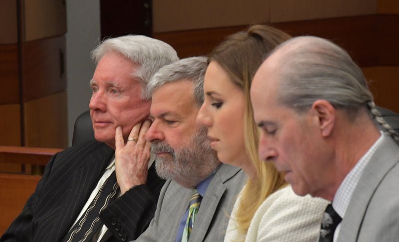 Tex McIver (left) sits with his defense attorneys (from left) Don Samuel, Amanda Clark Palmer and Bruce Harvey during Day 8 of the Tex McIver murder trial at Fulton County Courthouse on Thursday, March 22, 2018. HYOSUB SHIN / HSHIN@AJC.COM