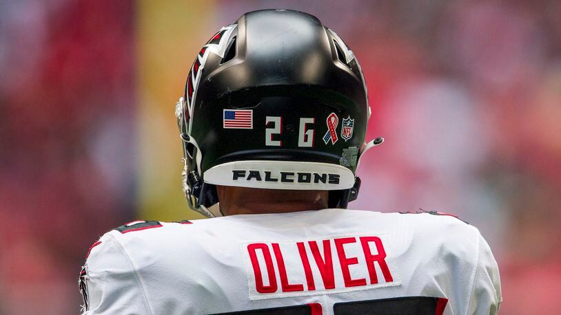 A 9/11 ribbon decal is worn on the helmet of Falcons cornerback Isaiah Oliver (26) during the first half  against the Philadelphia Eagles, Sunday, Sep. 12, 2021, in Atlanta. (Danny Karnik/AP)