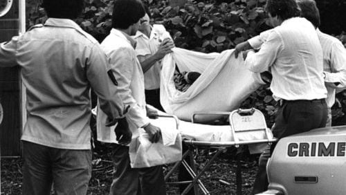 Atlanta police officers remove the body of a child from the Chattahoochee riverbank in this 1980 photo. Most of the Atlanta Child Murder victims were young male children or teens. So many children disappeared in 1980 it was called the "Summer of Death" in Atlanta.