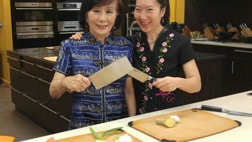 Natalie Keng (right) teaches a cooking class with her mother, Margaret Keng. In addition to the classes, Natalie Keng’s business, Chinese Southern Belle, offers chef demos, and sells prepared sauces and Asian kitchenware. Courtesy of Natalie Keng.