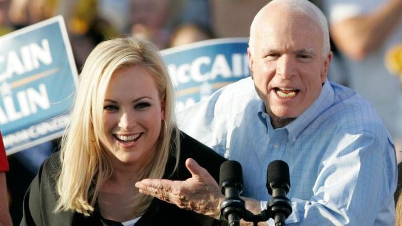 In this Aug. 30, 2008, file photo, former Republican presidential candidate, Sen. John McCain, right, introduces his daughter, Meghan, at a campaign stop in Washington, Pa. (AP Photo/Keith Srakocic, File)