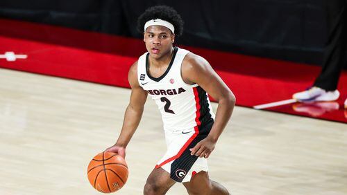 Georgia sophomore guard Sahvir Wheeler (2) became the first player in UGA history to record a 'triple double' when he had 14 points, 13 assists and 11 rebounds in the Bulldogs' 91-78 upset of LSU on Tuesday, Feb. 23, 2021, at Stegeman Coliseum in Athens. (Photo by Tony Walsh/UGA)