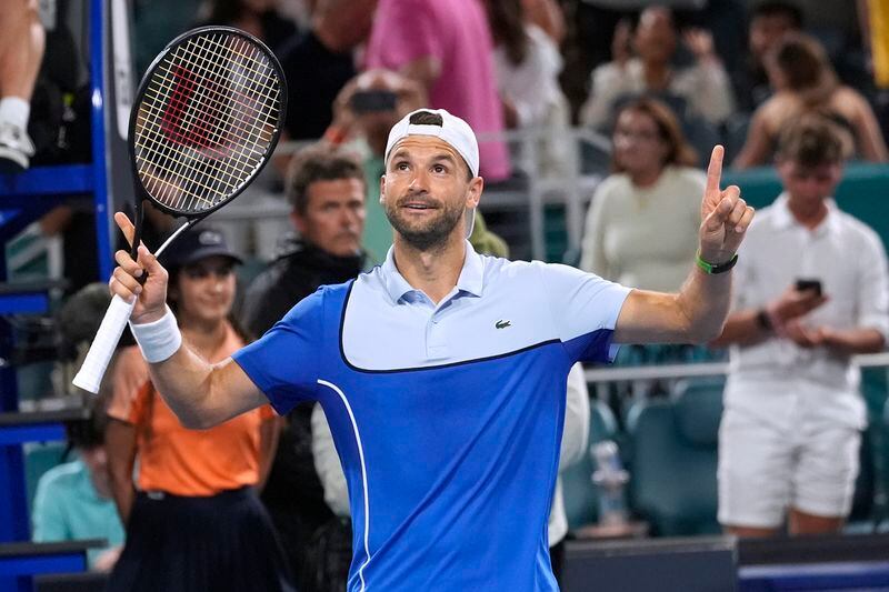 Grigor Dimitrov, of Bulgaria, celebrates after defeating Alexander Zverev, of Germany, in the semifinals of the Miami Open tennis tournament Friday, March 29, 2024, in Miami Gardens, Fla. (AP Photo/Marta Lavandier)