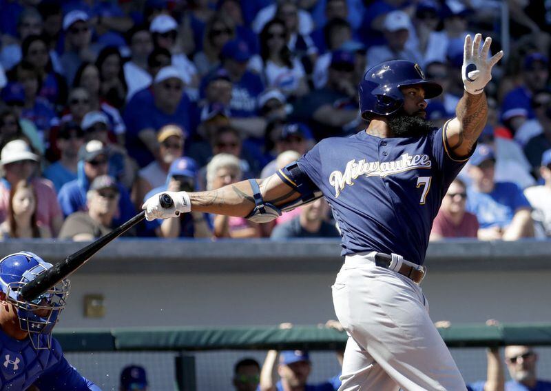 The Brewers' Eric Thames leads the majors in home runs (11) and OPS (1.393) and slugging percentage (.904) and has 10 homers in his past 14 games entering Friday's series opener against the Braves. (AP photo)