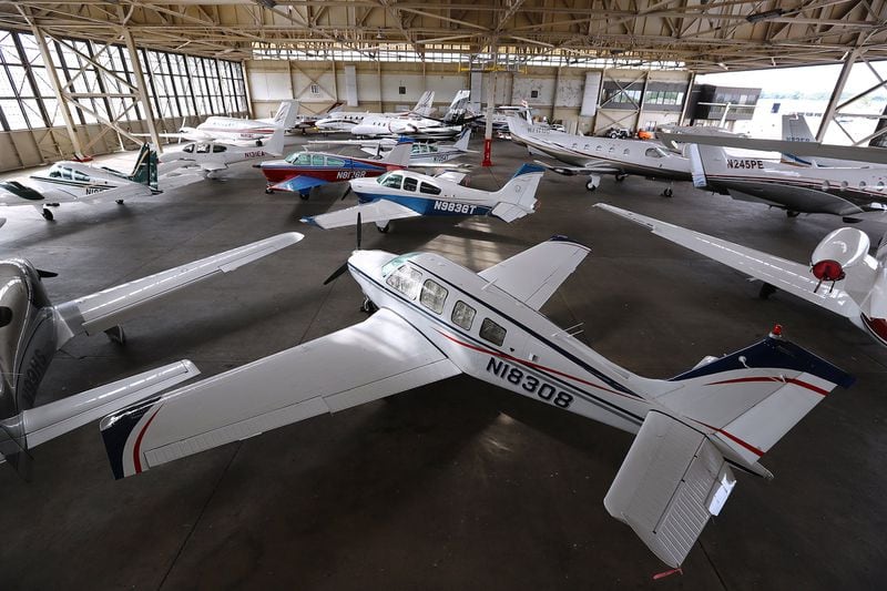 Planes fill a hangar at DeKalb-Peachtree Airport. Curtis Compton/ccompton@ajc.com