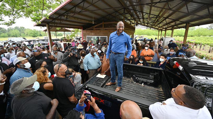 U.S. Sen. Raphael Warnock speaks to Black farmers in Byromville, in Middle Georgia. Warnock, a member of the Senate Agriculture Committee, helped secure a $5 billion infusion into this year's $1.9 trillion federal coronavirus relief package to help disadvantaged farmers of color. Under the Trump administration, the same farmers received only about 0.1% of what was given to American farmers through coronavirus relief. (Hyosub Shin / Hyosub.Shin@ajc.com)