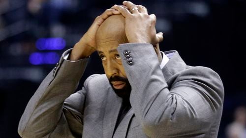 New York Knicks coach Mike Woodson reacts to a call in the first half against the Indiana Pacers Thursday, Jan. 16, 2014, in Indianapolis. (Michael Conroy/AP)