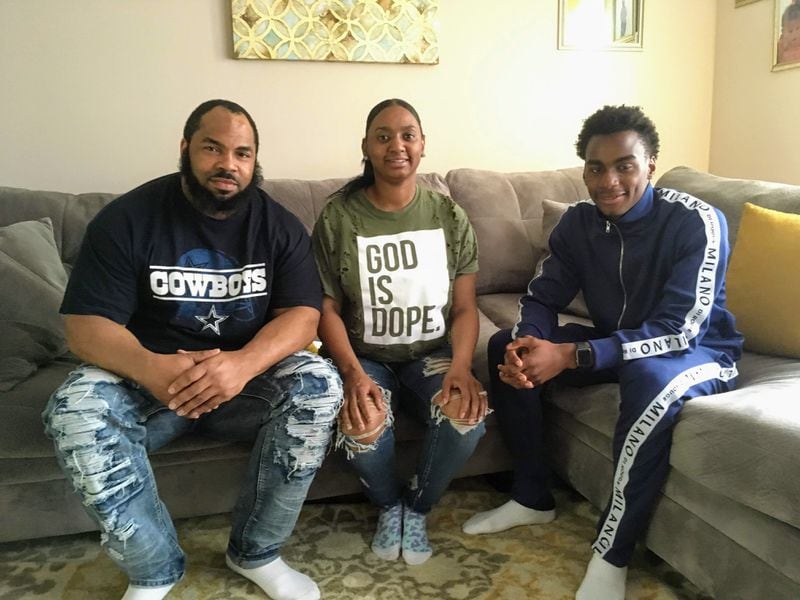 Georgia Tech freshman wide receiver Nazir Burnett (right) with his mother LaToya Elam and stepfather Genaro "Buster" Elam at their home in Harrisburg, Pa.