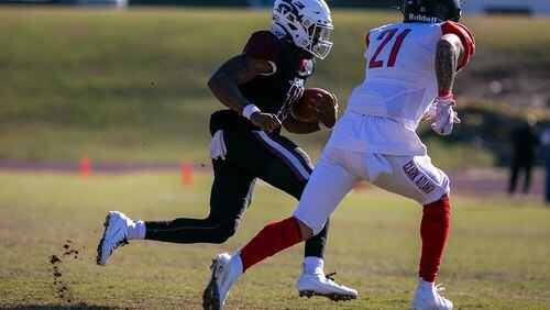 Morehouse quarterback Jalen Brown (11) carries the ball during a game between Morehouse and Clark Atlanta at B.T. Harvey Stadium in Atlanta, Georgia, on Saturday, Nov. 9, 2019. Morehouse defeated Clark Atlanta 40-39. (Photo/Rebecca Wright for the Atlanta Journal-Constitution)