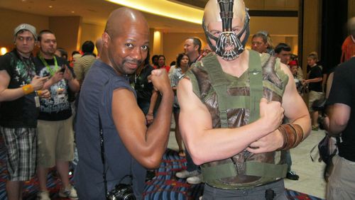 Channing Sherman (left), organizer of the Black Geeks of Dragon Con photo shoot, poses with a Bane cosplayer at Dragon Con 2012. CONTRIBUTED BY CHANNING SHERMAN