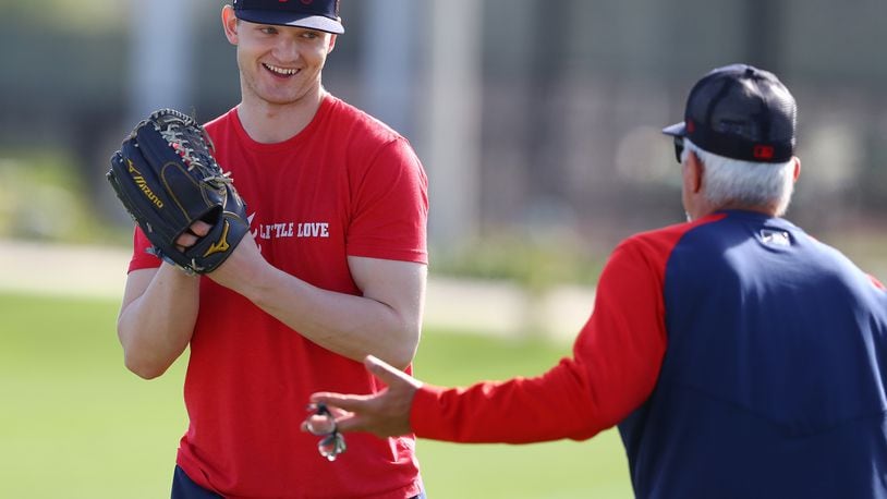 Injured Braves pitcher Mike Soroka, recovering from an Achilles tendon tear, works with pitching coach Rick Kranitz in March in North Port, Fla. (Curtis Compton / Curtis.Compton@ajc.com)