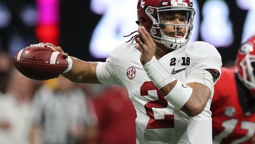 January 8, 2018 Atlanta: Alabama quarterback Jalen Hurts passes against Georgia during the first half in the College Football Playoff National Championship on Monday, January 8, 2018, in Atlanta.    Curtis Compton/ccompton@ajc.com