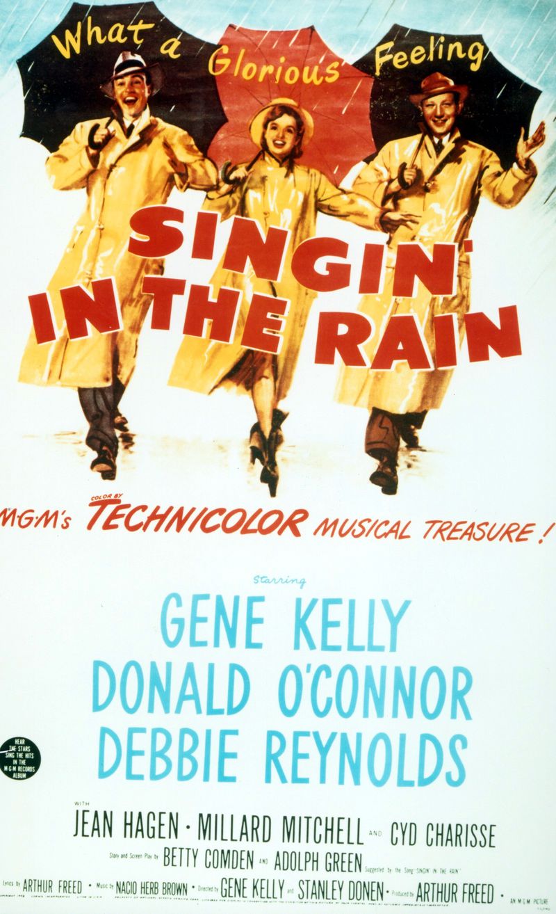A copy of the poster for the Hollywood musical ‘Singin’ In The Rain’. Left to right are Gene Kelly, Debbie Reynolds, and Donald O’Connor. (SPECIAL PHOTO). For FEA.