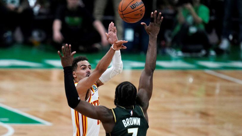 Game-winner: Trae Young (11) takes the game-winning shot over Boston Celtics guard Jaylen Brown (7) during the final seconds of Game 5 in a first-round NBA basketball playoff series Tuesday, April 25, 2023, in Boston. (AP Photo/Charles Krupa)