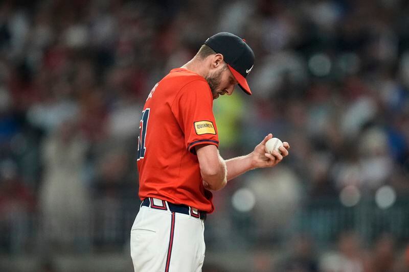 Atlanta Braves pitcher Chris Sale (51) stands on the mound during the seventh inning of a baseball game against the Cleveland Guardians, Friday, April 26, 2024, in Atlanta. (AP Photo/Mike Stewart)