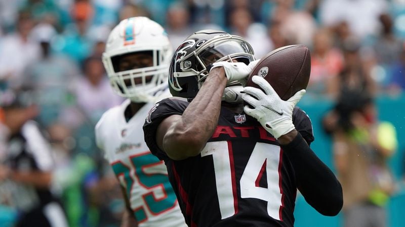 Falcons wide receiver Russell Gage (14) makes the catch to score a touchdown as Miami Dolphins cornerback Xavien Howard (25) looks on, during the second half Sunday, Oct. 24, 2021, in Miami Gardens, Fla. (Hans Deryk/AP)