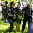 Police arrest pro-Palestinian protesters who set up an encampment at the Emory University campus in Atlanta on Thursday, April 25, 2024. (Arvin Temkar/The Atlanta Journal-Constitution/TNS)