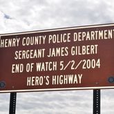 Henry County unveiled a memorial marker Wednesday to remember the life of Henry Police Sgt. James Gilbert. The marker is on Jonesboro Road at the intersection with Commerce Drive.