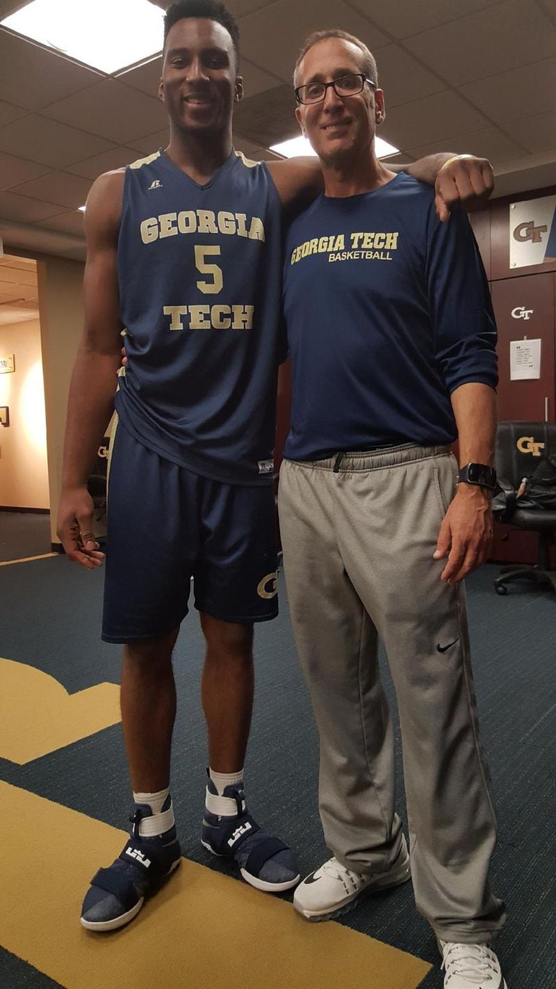 Ron Bell, who gained remarkable access to Georgia Tech’s basketball program as a friend of head coach Josh Pastner, stands with guard Josh Okogie in the Tech locker room at McCamish Pavilion. Photo courtesy of Ron Bell.