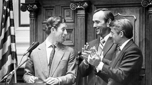 771022 - Atlanta, Georgia - Prince Charles draws applause from Gov. George Busbee and Lt. Gov. Zell Miller at the State Capitol, Oct. 21, 1977. (AJC Staff Photo/Minla Shields