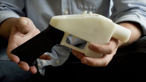 This plastic pistol, photographed in 2013, was completely made on a 3D-printer at a home in Austin, Texas. (Jay Janner/Austin American-Statesman via AP, File)