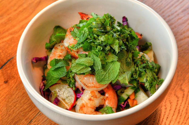Crunchy Asian Veggie Salad, Cashews, Ginger Dressing, Shrimp a la Plancha. CONTRIBUTED BY CHRIS HUNT PHOTOGRAPHY