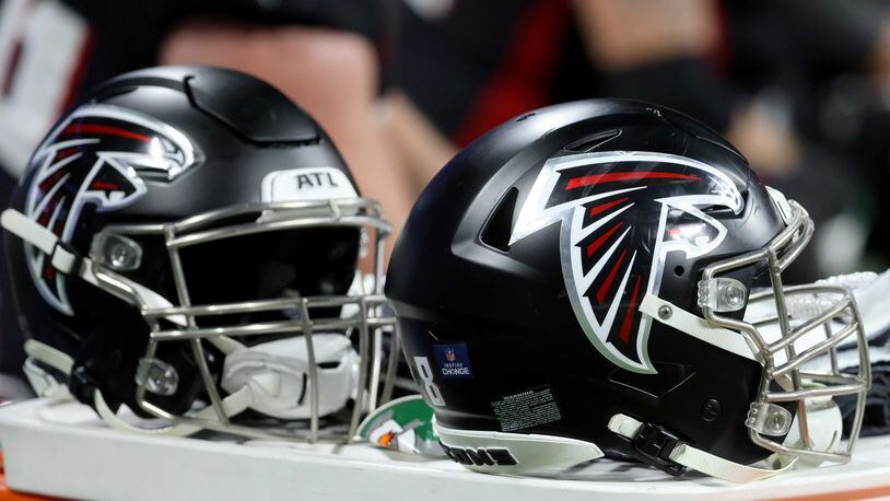 Falcons helmets are shown during the second half against the New Orleans Saints at Mercedes-Benz Stadium, Sunday, January 9, 2022, in Atlanta. The Falcons lost to the Saints 30-20. JASON GETZ FOR THE ATLANTA JOURNAL-CONSTITUTION